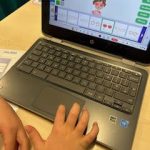 Student using a laptop.